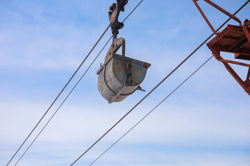 Wall Mural - Closeup view of chemical factory cable car.