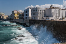Waves Splash On The Malecon Sea Wall In La Havana Cuba