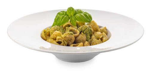 Wall Mural - Macaroni pasta with pesto in a white dish with basil leaves, pesto is a typical Genoese sauce of basil, pine nuts, olive oil and parmesan cheese. 