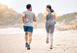 © Azeemud/peopleimages.com - Running can help you live longer. Rearview shot of a sporty young couple running together on the beach.