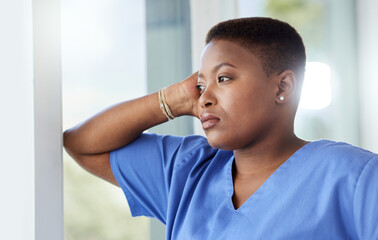 Poster - Every nurse was drawn to nursing. Shot of a female nurse looking stressed while standing in a hospital.