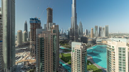 Panorama showing Dubai Downtown cityscape with tallest skyscrapers around aerial timelapse.