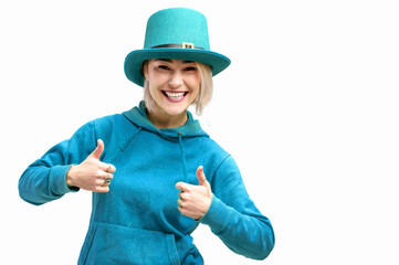 Smiling woman. Beautifu young woman wearing blue hat and in a blue sweatshirt.