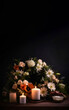 Mourning flowers and candles on a dark background in the form of a bouquet for condolences, generated by ai