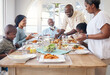 © Siphosethu Fanti/peopleimages.com - Families that eat together stay together. Shot of a family having lunch at home.