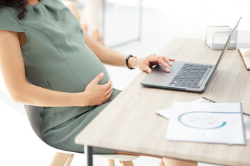 Poster - Sorting all her tasks before maternity leave. Closeup shot of a pregnant businesswoman working on a laptop in an office.