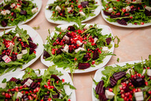 Salad With Beetroot From Arugula With Cheese And Pomegranate. Vegetarian Food.
