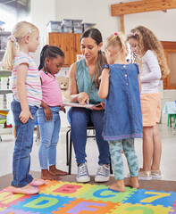 Poster - I love a good book as much as they do. Shot of a young woman reading to her preschool students.