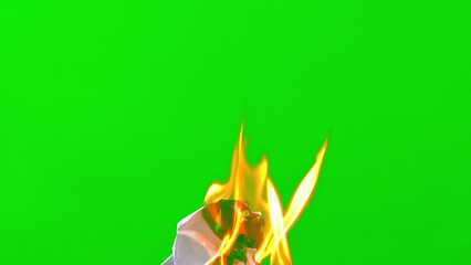 Wall Mural - fire flame burning paper on green screen background