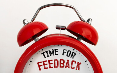 Poster - red alarm clock with text time for feedback