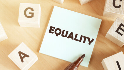 Poster - Sticker with text Equality in the middle of wooden cubes with letters