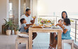 © Kirsten D/peopleimages.com - Laughter and love is what life is all about. Shot of a young family having lunch together at home.