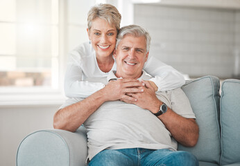 Poster - Two peas in a pod. Shot of a happy senior couple relaxing on the sofa at home.
