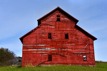 Big Red Wooden Barn With Three Stories