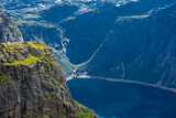 Fototapeta Na sufit - Amazing cliff over the Ringedalsvatnet lake in Trolltunga mounatin area,  Norway
