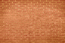 Texture Of Bright Orange Brick Wall As Background