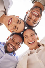 Poster - Were all dedicated to big results. Low angle shot of a group of businesspeople standing with their heads together in a huddle.