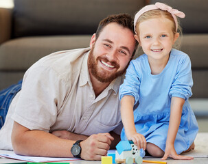 Poster - Portrait of father and daughter bonding at home. Dad watching daughter play with toys. Parent and child smiling happy to be together