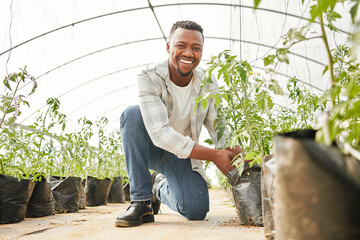 Poster - Time to plant some new crops. Full length shot of a handsome young man working on his farm.