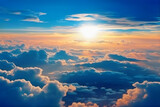 Fototapeta Na sufit - View above the clouds with a blue sky and a bright sun. summer solstice in the orange, white, and blue clouds.