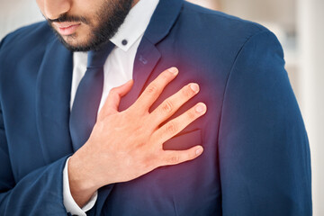 Poster - What could this pain be. Shot of an unrecognizable businessperson suffering from chest pain at work.
