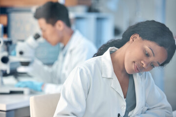 Poster - making the most of every moment. Shot of two coworkers peacefully working together in a lab.
