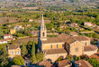 High angle view of the second, newer, 18th century church known as the Eglise Bas, in the picturesque village of Bonnieux in the Luberon region of Provence, France.