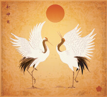 Two Dancing Crane Birds And Big Red Sun On Vintage Background. Traditional Japanese Ink Wash Painting Sumi-e. Translation Of Hieroglyphs - Harmony, Spirit. Perfection