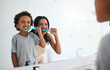 © Wesley JvR/peopleimages.com - Learning, mother and son brushing teeth, dental hygiene and wellness at home, bathroom and bonding. Family, female parent or mama with male child, kid or boy with oral health, cleaning mouth or smile