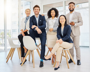 Success, happy and portrait of business people on chair in office with confidence, pride and motivation. Teamwork, diversity and group of men and women smile for goals, company mission and happiness