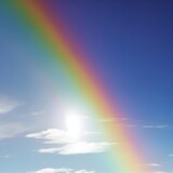 Fototapeta Tęcza - rainbow in the blue sky