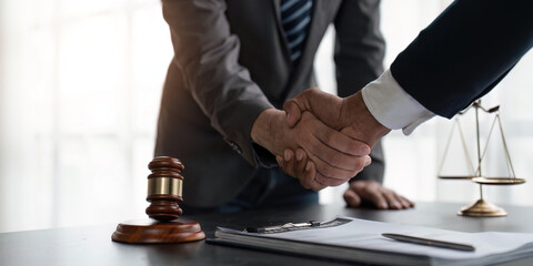 Wall Mural - Handshake after cooperation between attorneys lawyer and clients discussing a contract agreement legal fighters, Concepts of law, advice