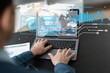 © Natee Meepian - Businessman concept of digital data for analyzing the chart and graph while sitting in the office room useing laptop