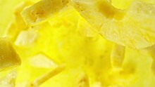 Super Slow Motion Of Rotating Pineapple Slices, Top View. Filmed On High Speed Cinema Camera, 1000 Fps, Placed On High Speed Cine Bot, Following The Target. Speed Ramp Effect.