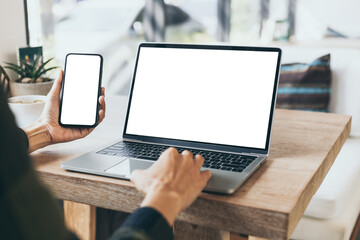 computer screen,cell phone blank mockup.hand woman work using laptop texting mobile.white background for advertising,contact business search information on desk in cafe.marketing,design