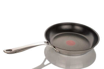 Canvas Print - One metal frying pan, macro, isolated on white background.