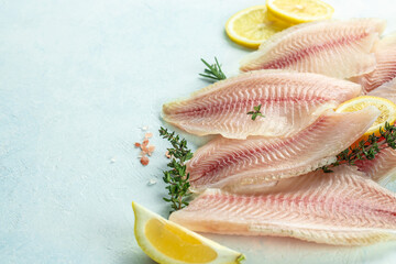 Sticker - White fish tilapia fillet ready to cook. superfood concept. Healthy, clean eating