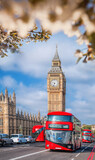 Fototapeta  - Famous Big Ben with red double decker bus on bridge over Thames river during springtime in London, England, UK