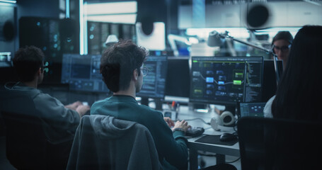 Aufkleber - Diverse Software Development Department Working in a Cyber Security Artificial Intelligence Company. Web Engineers Working on a Desktop Computers. Shot from the Back