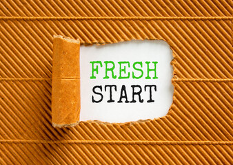 Fresh start and motivational symbol. Concept words Fresh start on beautiful white paper. Beautiful brown paper cardboard background. Business motivational Fresh start concept. Copy space.