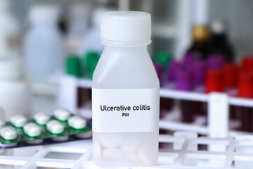 Poster - Ulcerative colitis pill in white bottle, pill stock