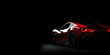 Stylish red sport car on the black background banner with copy space
