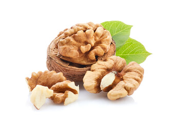Wall Mural - Walnuts with leaves on white background