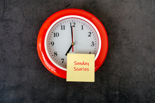 Wall Mural -  - Sunday scaries text on adhesive note on top of clock