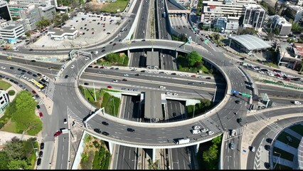 Wall Mural - Aerial drone video of ring road junction passing through Marousi residential area connecting Attiki odos highway and Kifisias Avenue, Attica, Greece