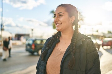 Poster - Young hispanic woman smiling confident standing at street