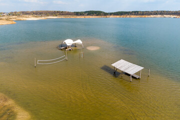 Flooded recreation area on a sandy beach