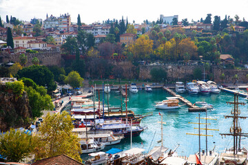 Wall Mural - The old port of Antalya - Antalya Kaleici Yat Limani. The old town. With yachts, boats. and old buildings. View from above. Antalya, Turkiye.