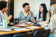 © Mediteraneo - Modern business team discussing new ideas at the office. Business people on meeting in modern office.