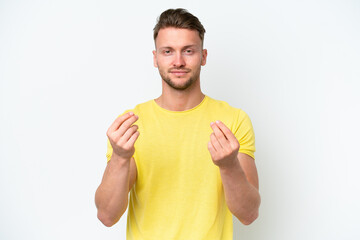 Wall Mural - Young blonde caucasian man isolated on white background making money gesture but is ruined